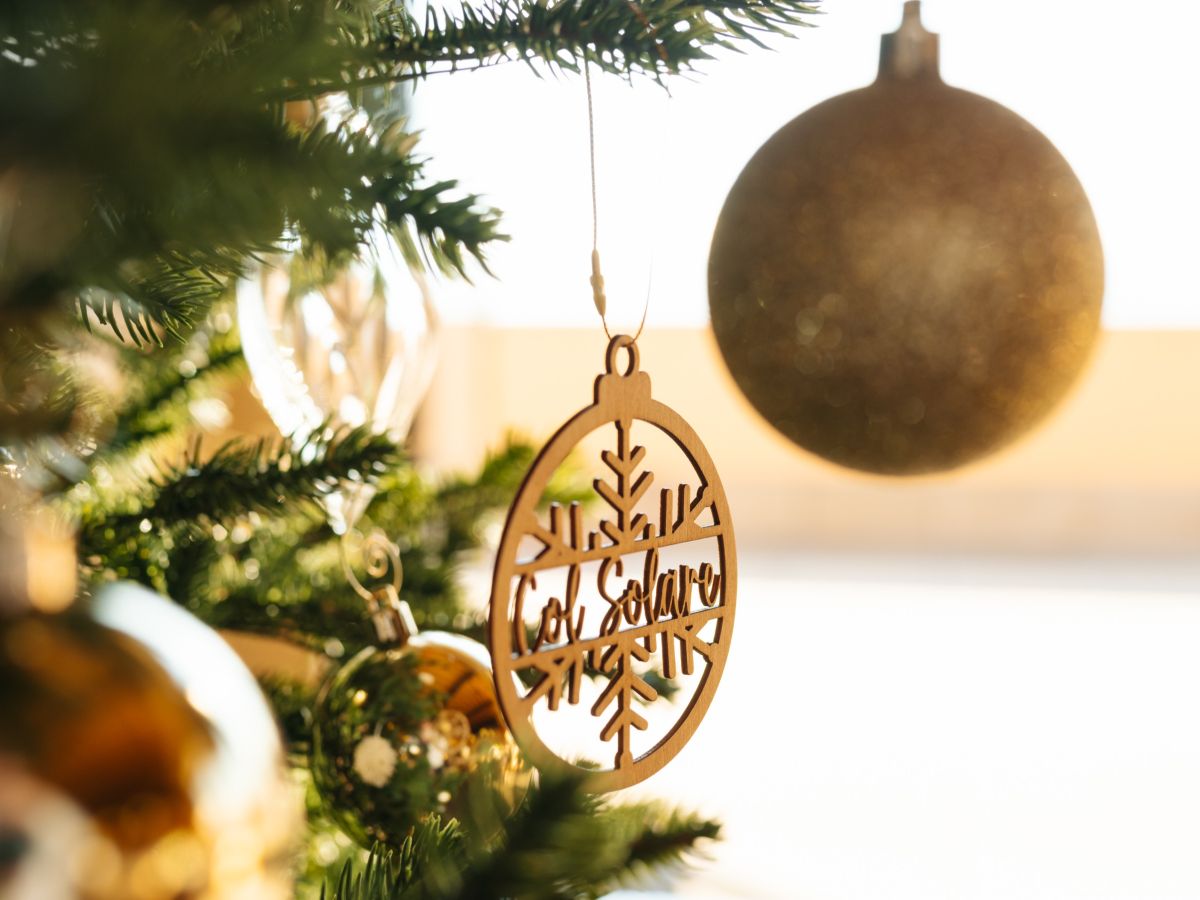 col solare ornament on tree